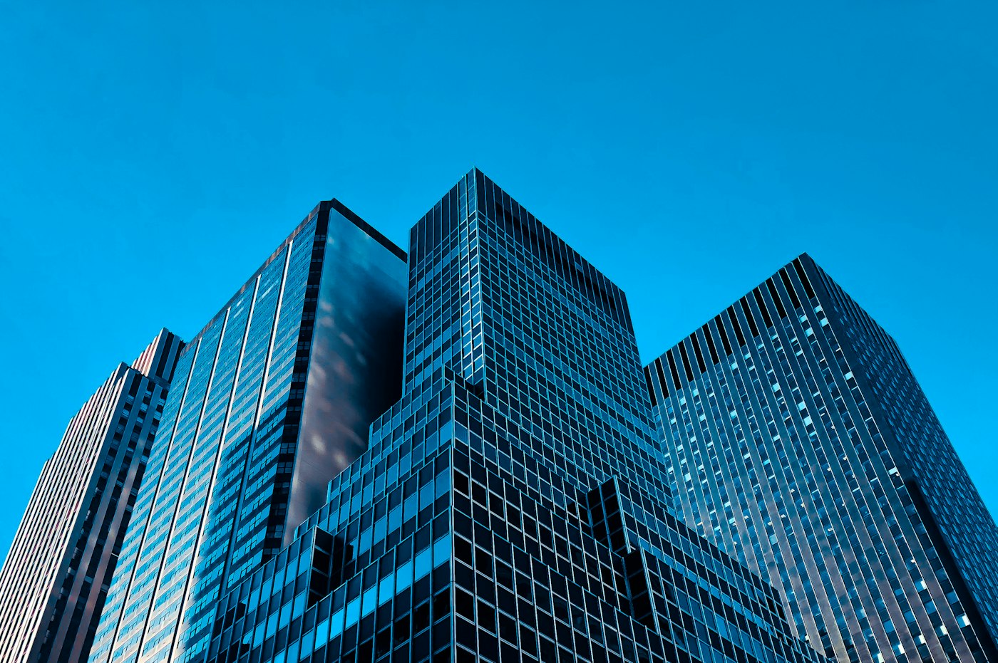 Modern glass-walled boardroom overlooking the city